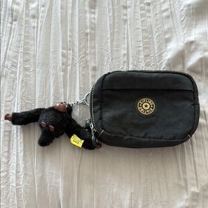 Kipling Black Quilted Cosmetic Bag with Gold Medallion